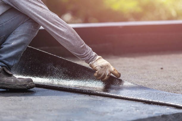 Professional Emergency Waterproofing technician working in Lakeland, MI
